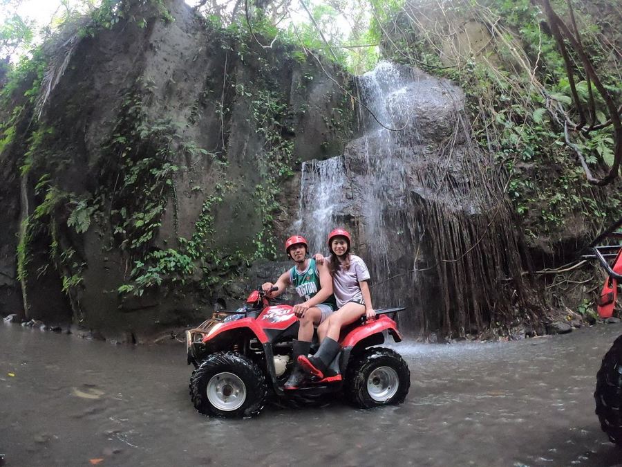ATV through a waterfall